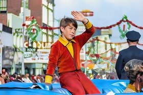 Will Robinson rides in a parade